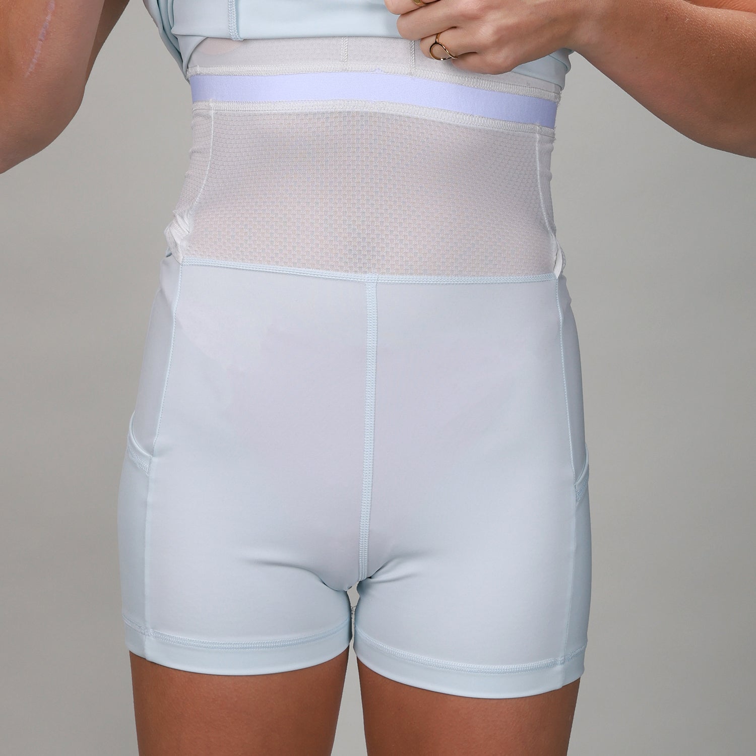 front of underlay with ice blue compression dress