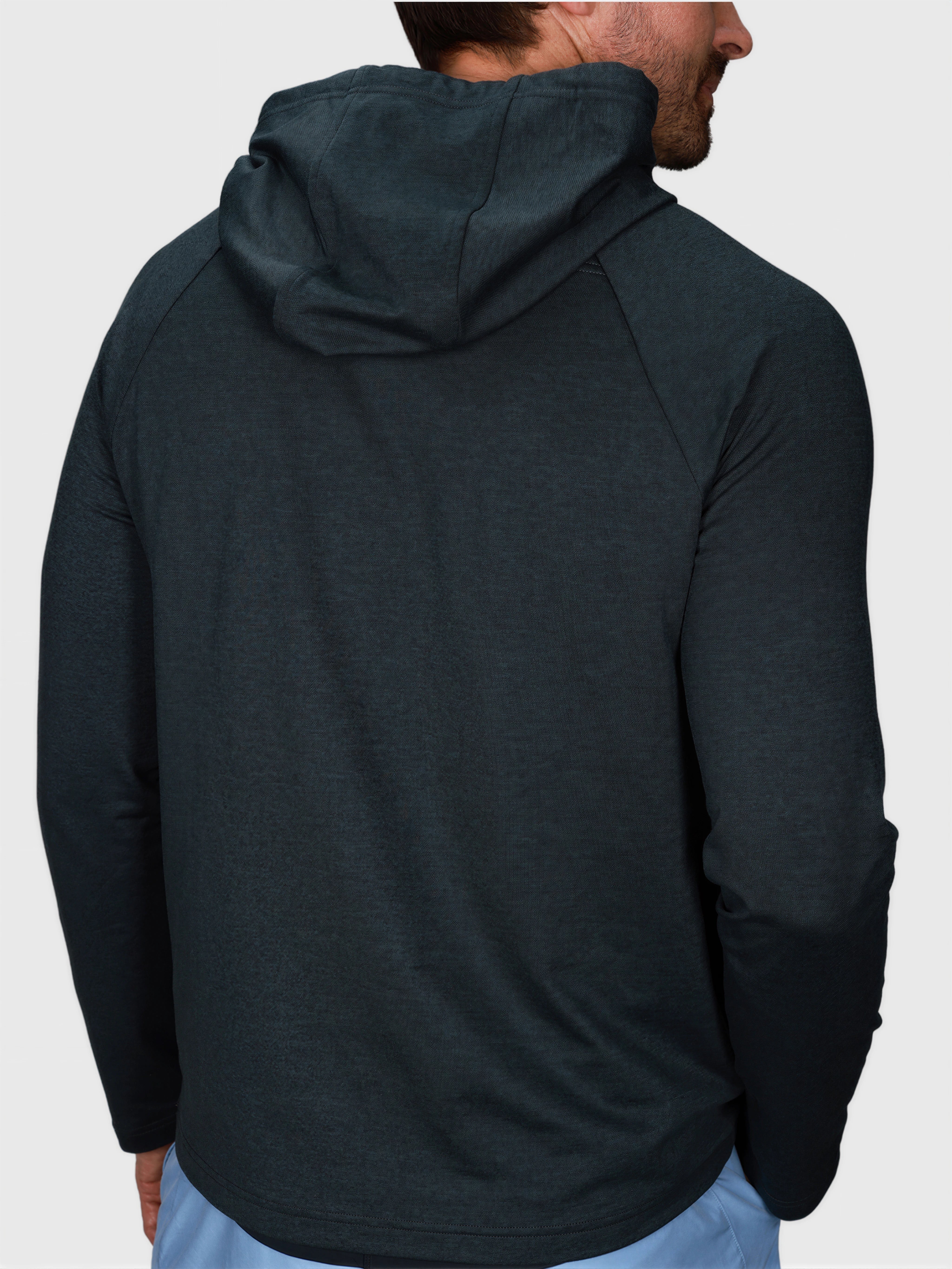 Man seen from behind wearing Heather Charcoal Pro Serve Hoodie by MUEV for padel and pickleball clothing