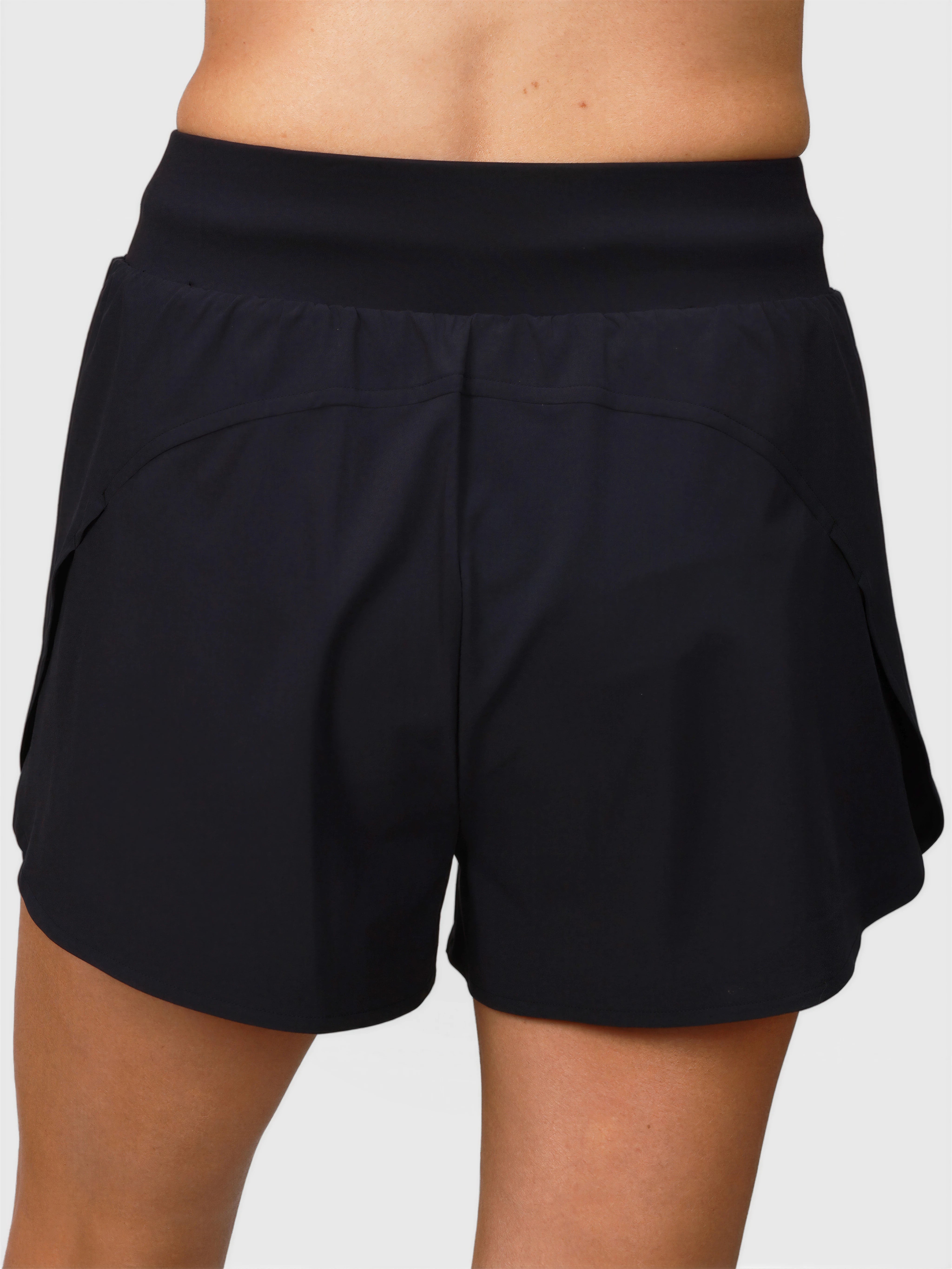 Back view of black Tulip Compression Short by MUEV designed for padel and pickleball clothing