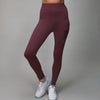 plum colored leggings with side and back pocket for ball