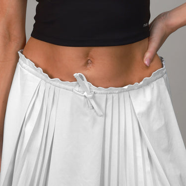 close up of white ruffle skirt 