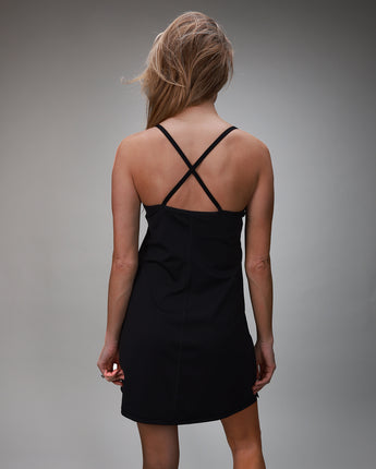 back of black tank dress with crisscross back straps