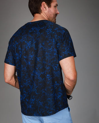 back of floral blue dink tee