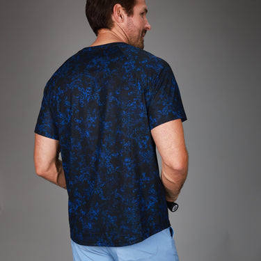 back of floral blue dink tee