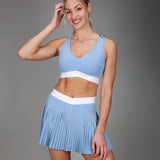 blue pleated skirt with blue tanklette