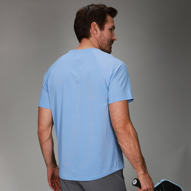 back of light blue dink tee