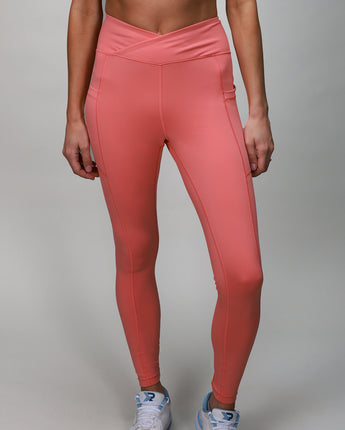 coral leggings with crossover fabric at top 