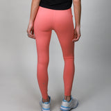 back of coral leggings with crossover fabric at top 