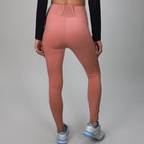 pink leggings with back strap and side pocket for ball 
