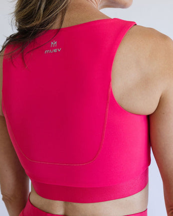 Back of pink sports bra on a person