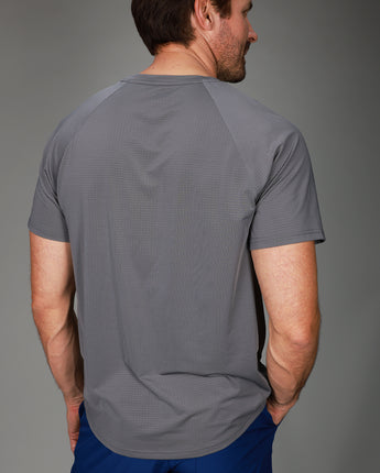 back of grey dink tee