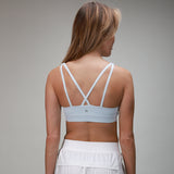 light blue sports bra with cross back 