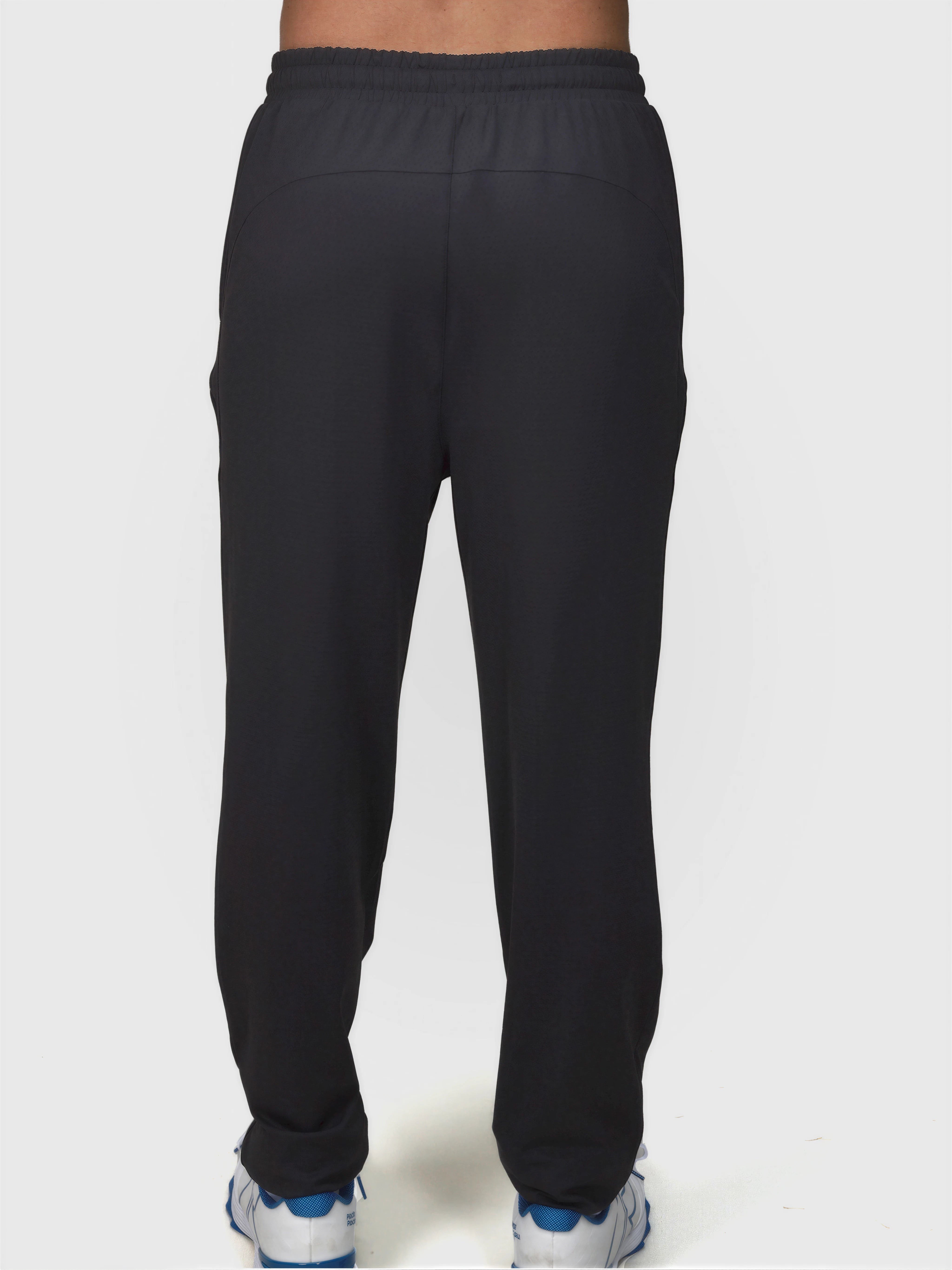 Back view of black Echelon Jogger by MUEV designed for padel and pickleball clothing comfort