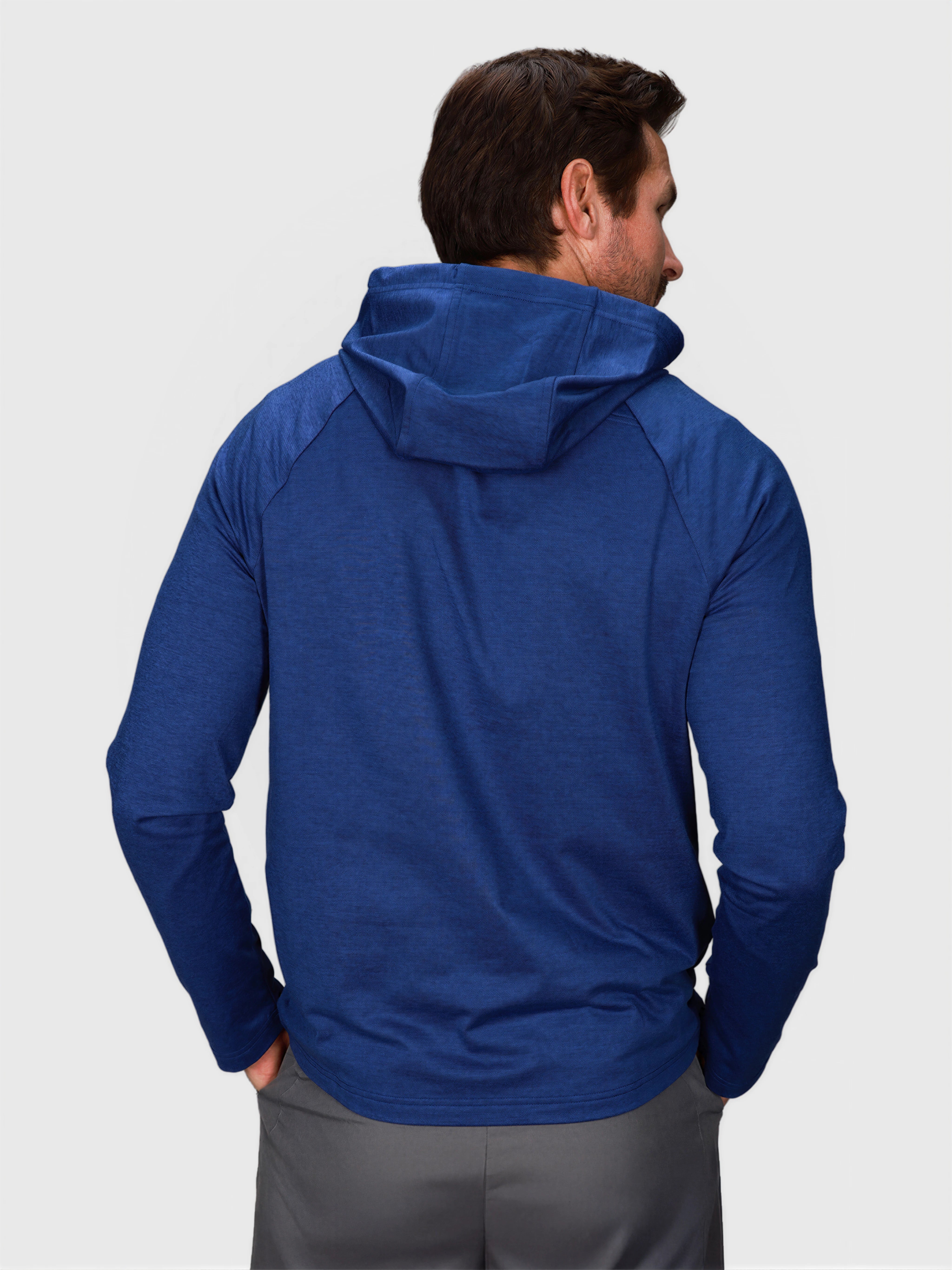 Man wearing Heather Navy Pro Serve Hoodie by MUEV shown from back for padel and pickleball apparel
