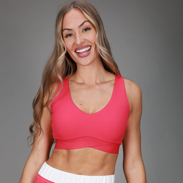 front of pink tanklette 