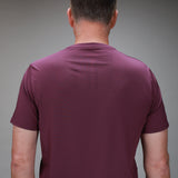back of plum chevron tee with muev logo 