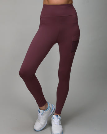 plum colored leggings with side and back pocket for ball 