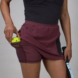 side of plum bonded skirt with ball pocket
