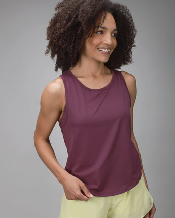 front of yellow short and plum tank 