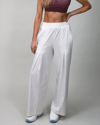 front of white pleated pant